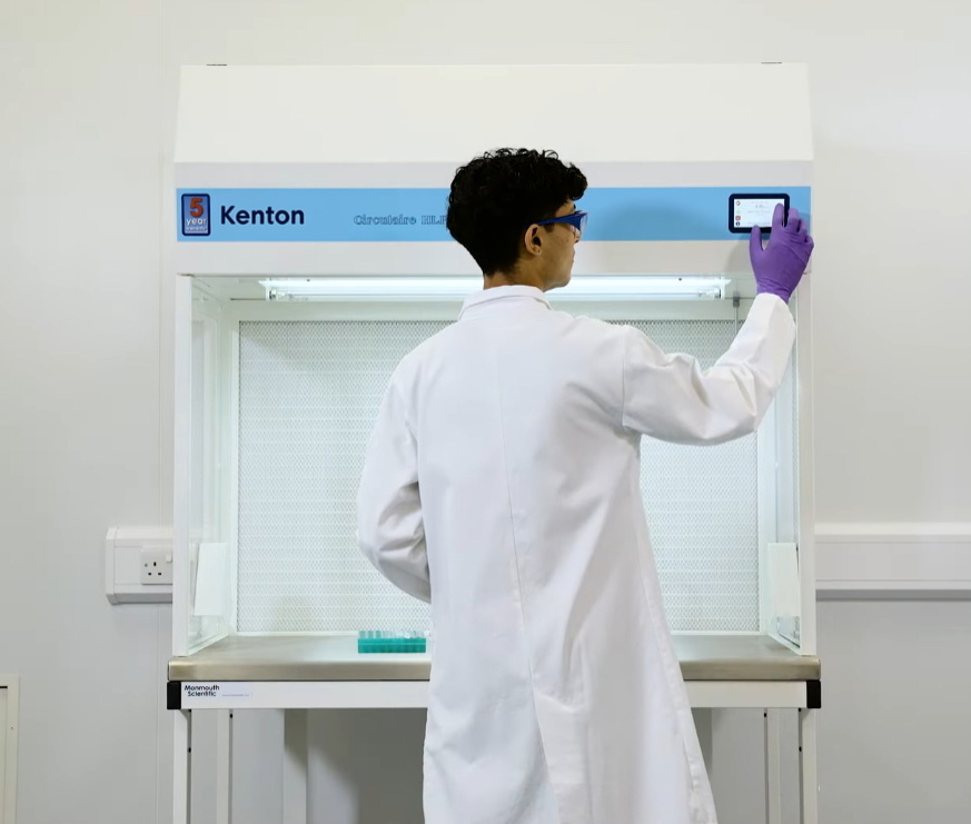 Laboratory Technician Working in Laminar Flow Cabinet